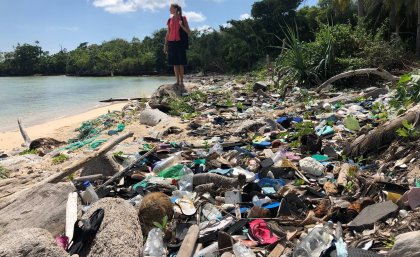Beach littered with plastic waste